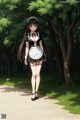 A woman in a maid outfit walking down a path in the woods.