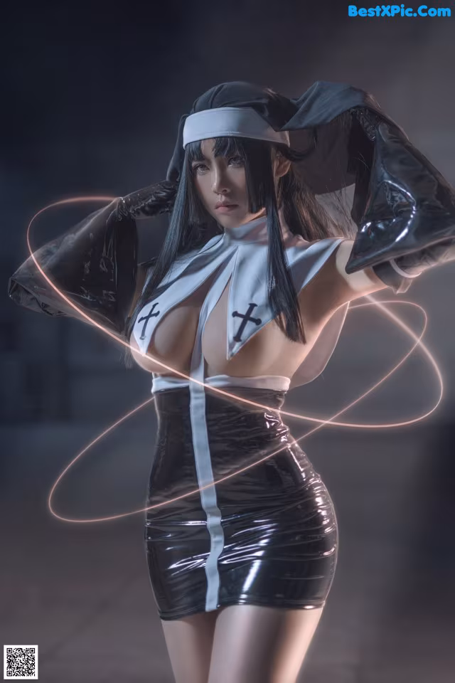 A woman dressed as a nun holding a hula hoop.
